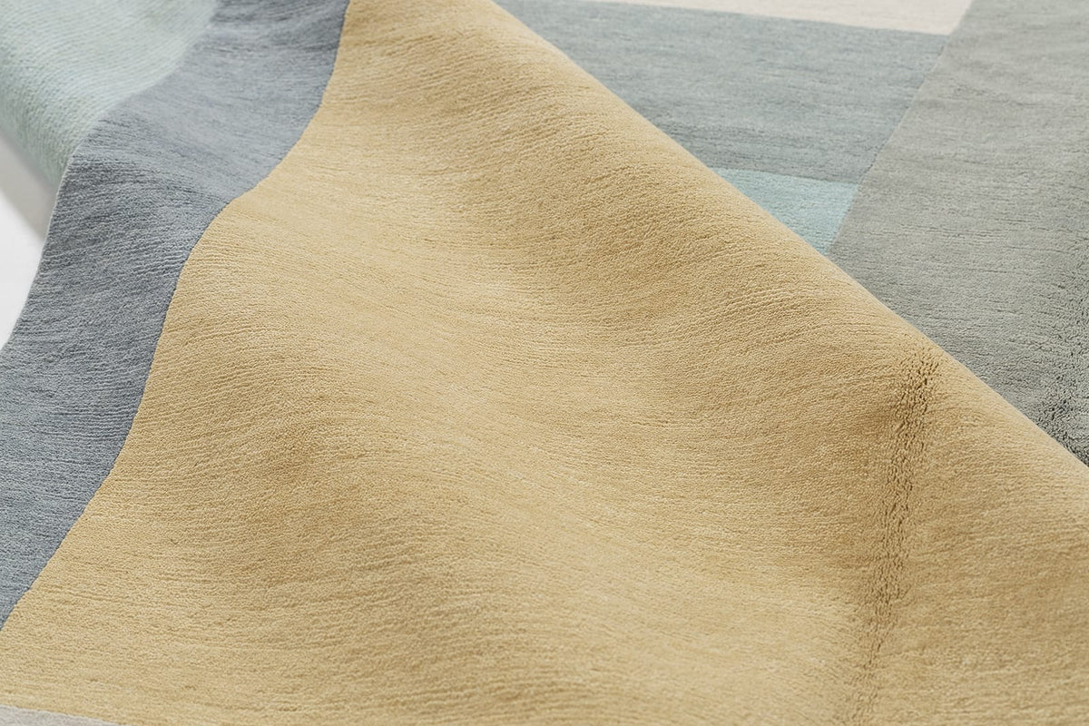 detail image of Monolith Light Blue hand knotted area rug design by Tufenkian