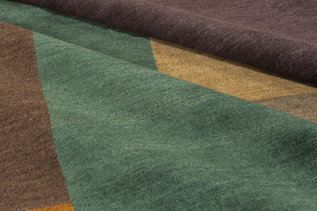 detail image of Monolith Pine hand knotted area rug design by Tufenkian