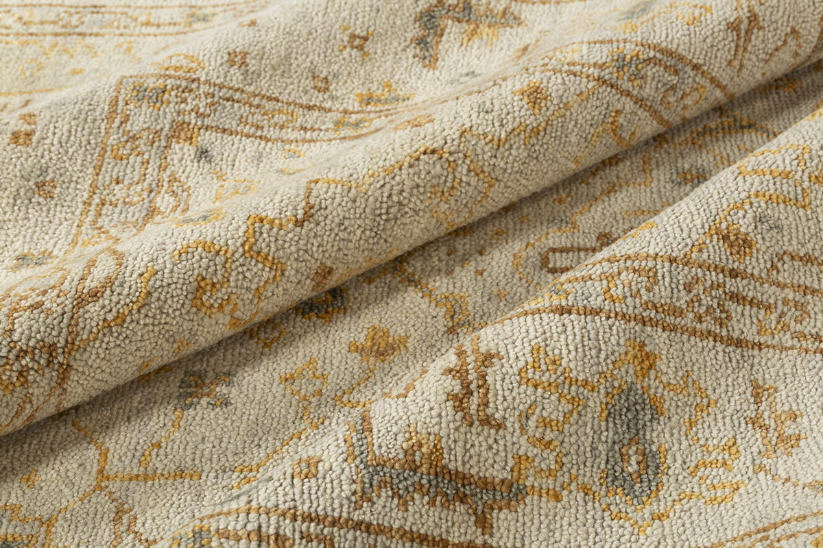 detail image of Tigranakert Ochre hand knotted area rug design by Tufenkian