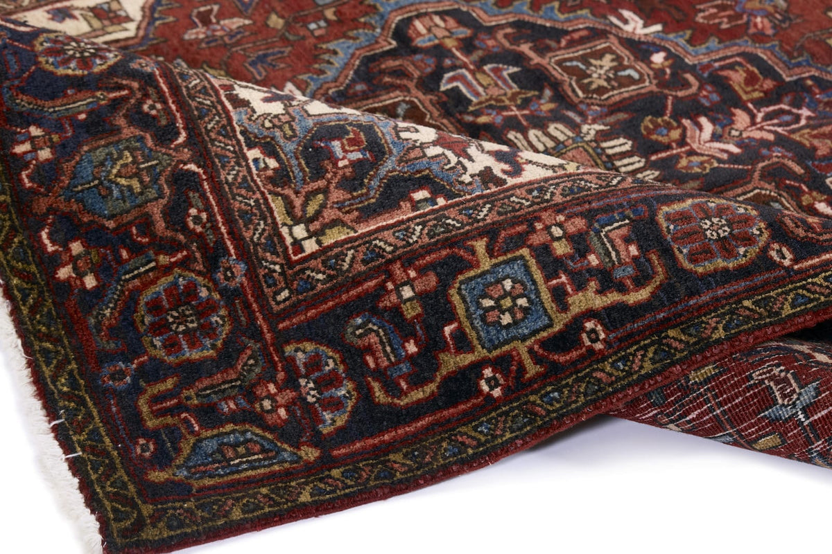 SEMI-ANTIQUE PERSIAN HERIZ  4' 11" X 6' 6"