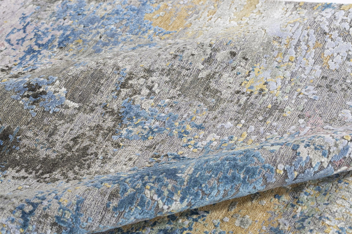 detail image of Niche Charcoal hand knotted area rug design by Tufenkian